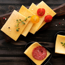 Fromage raclette en tranches 15 g surgelé 1,1 kg - Par 8